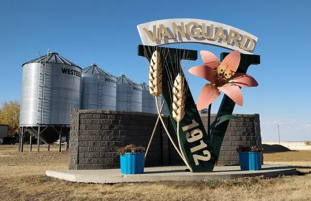 Vanguard town entrance monument with grain bins